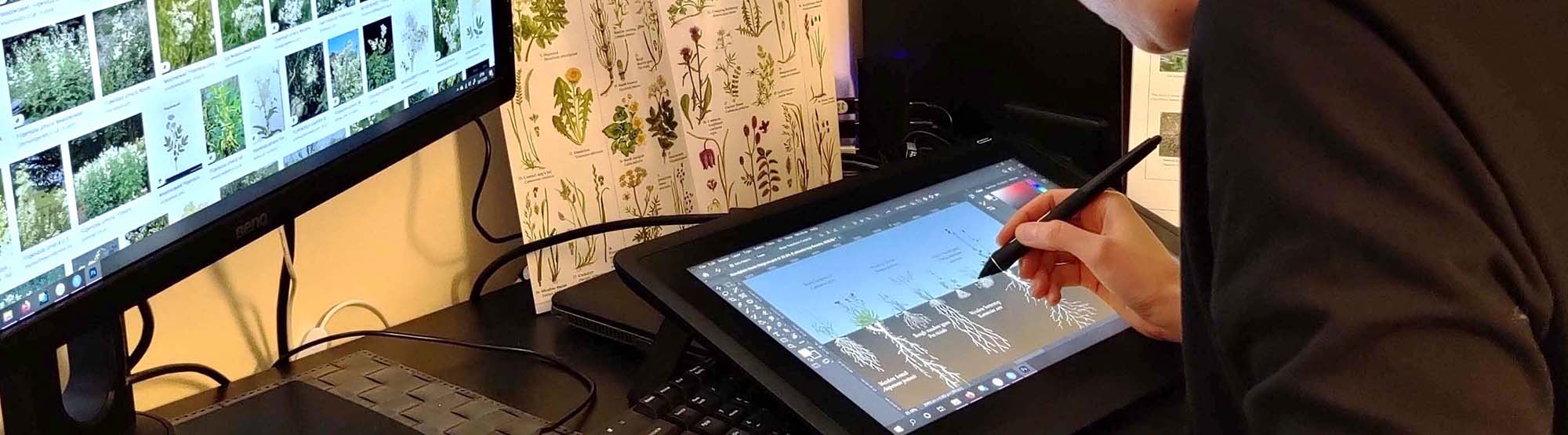 Photo of Vicky Bowskill creating digital art on a drawing screen